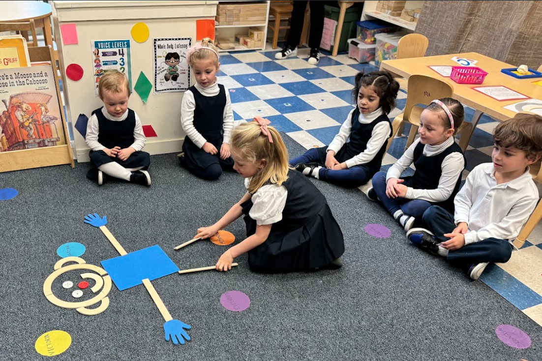 Nursery students playing with educational toys