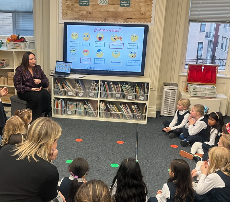 lower school student and teacher using iPad