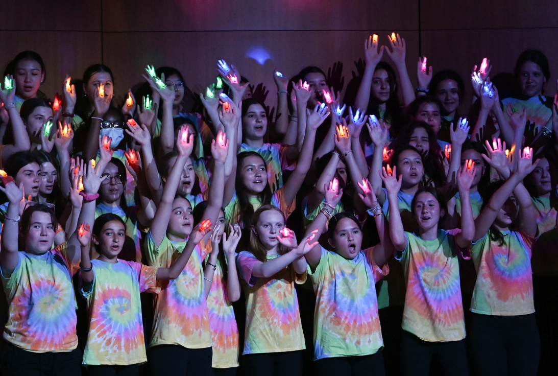 upper mid students performing on stage